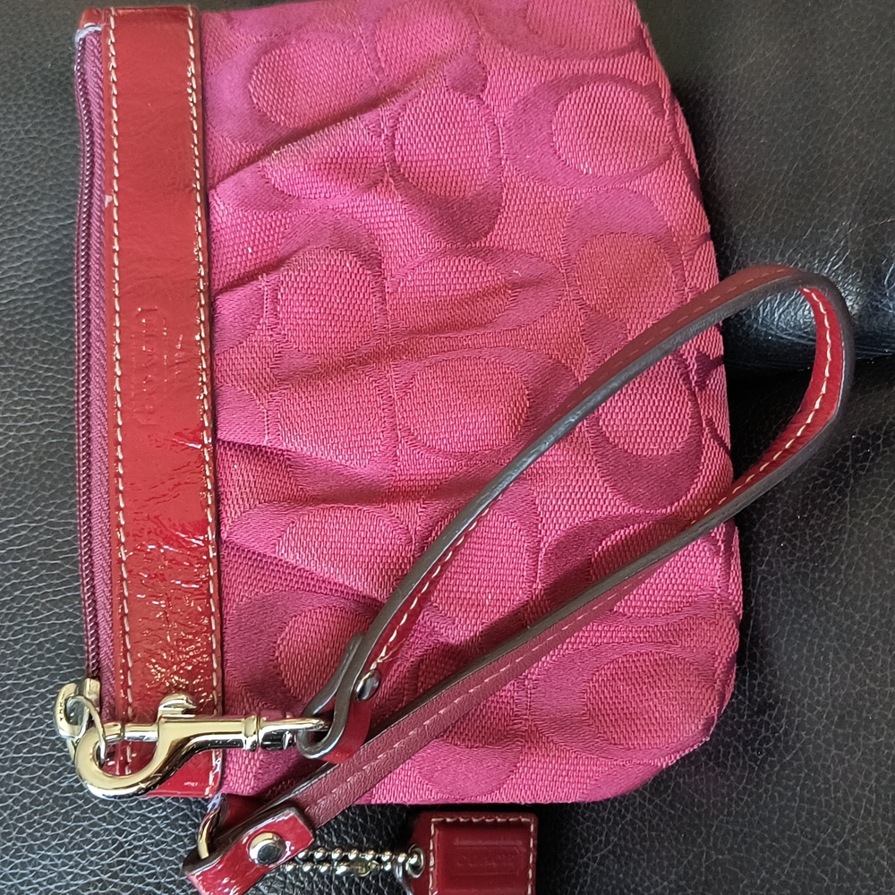 Coach burgundy wristlet